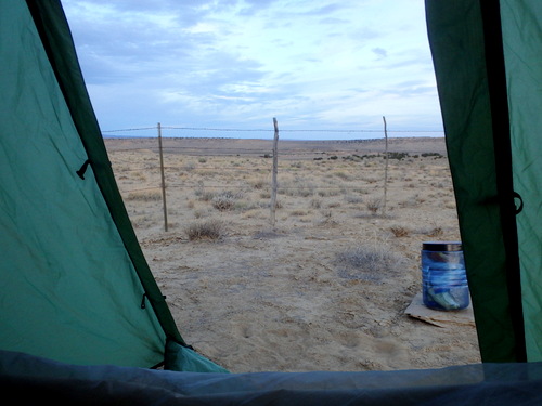 GDMBR: Morning comes, that is our Food Vault and the Felipe-Tafoya Land Grant fence.